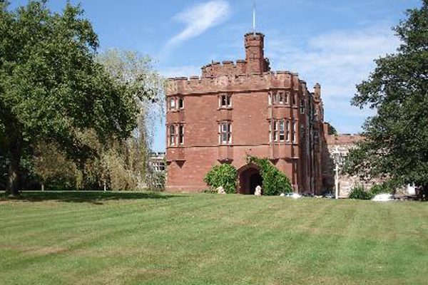 Two Night pictures of castles at night. Two Night