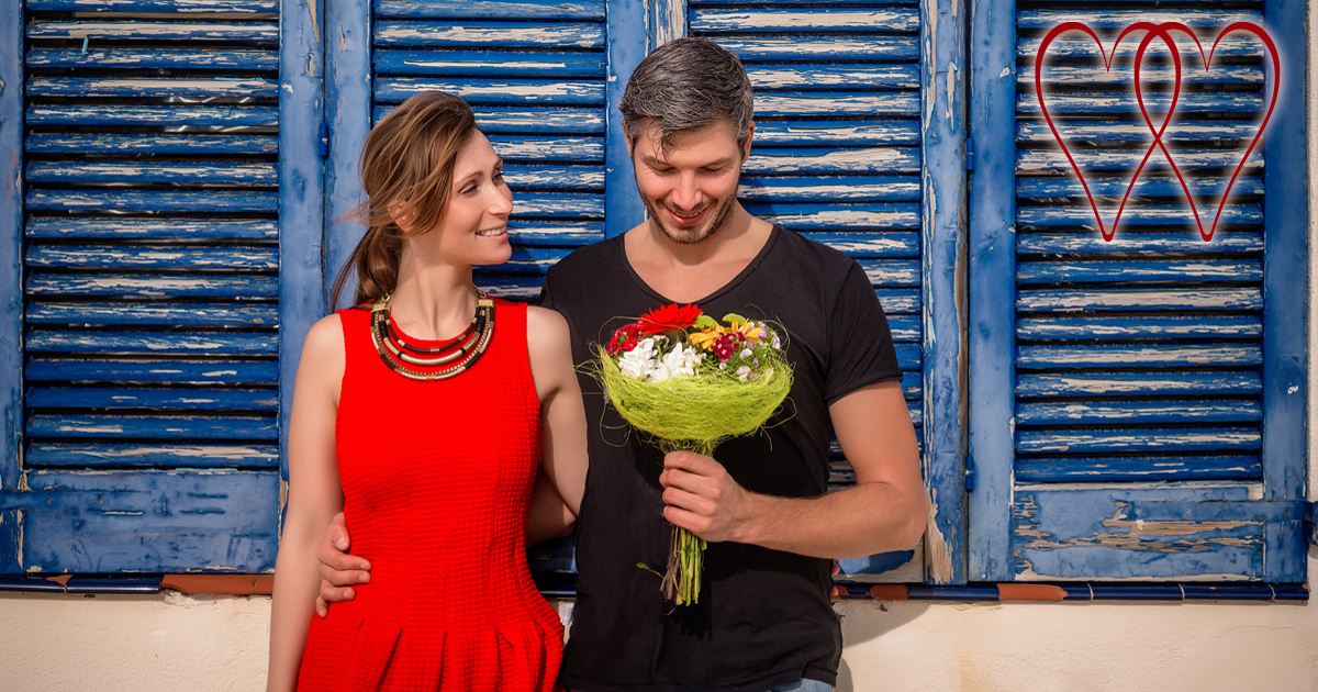 A man receiving gifts from his Valentine