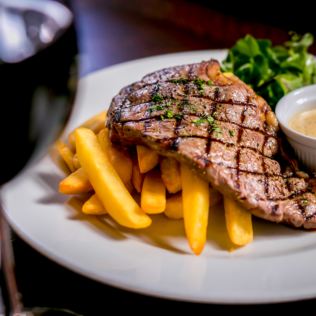 Sizzler Steak for Two with a Bottle of Wine Product Image