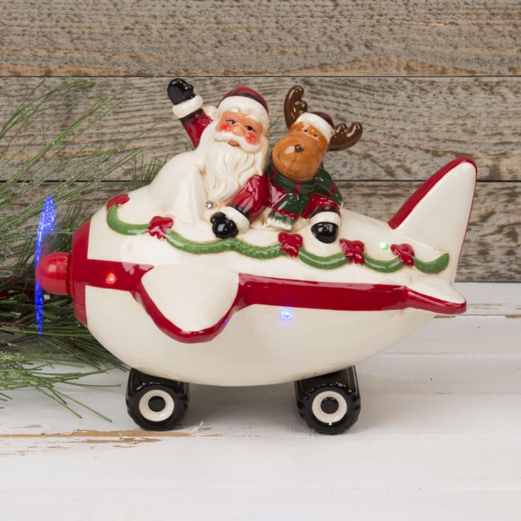 Ceramic Musical Santa in Plane Ornament with LED Lights product image