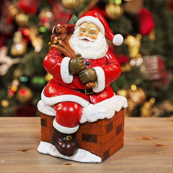 Santa Climbing into Chimney Figurine product image