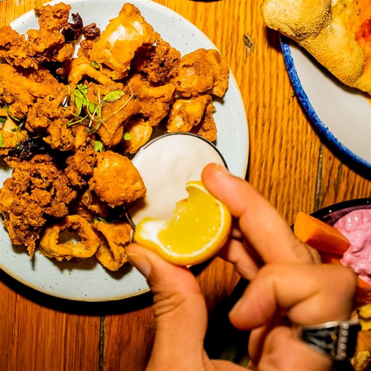 Bottomless Mojitos or Cruz Campo with 5 Plates product image