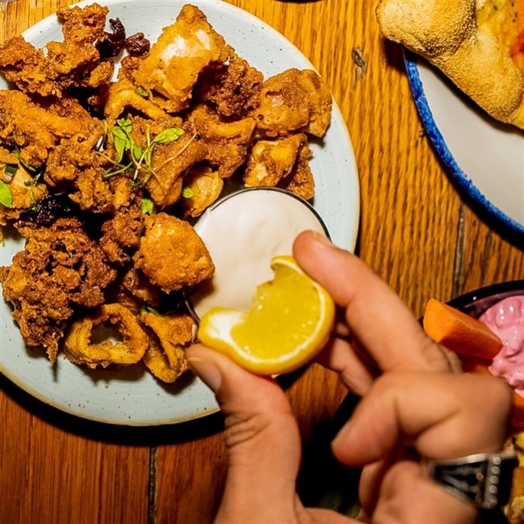 Small Plates & Cocktail at Revolution Bars product image