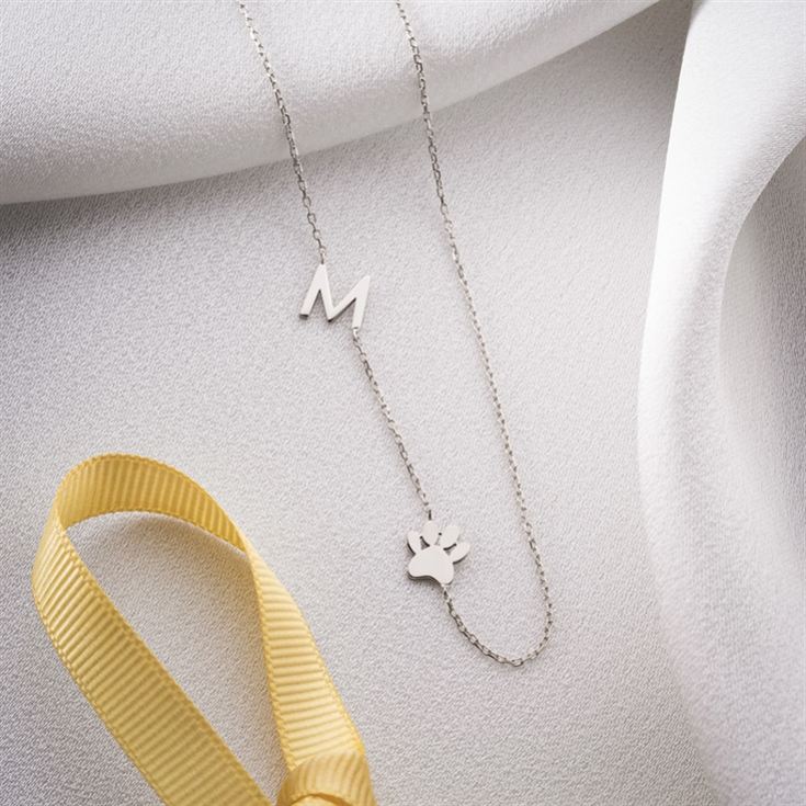 Sideway Initial and Dog Paw Necklace product image
