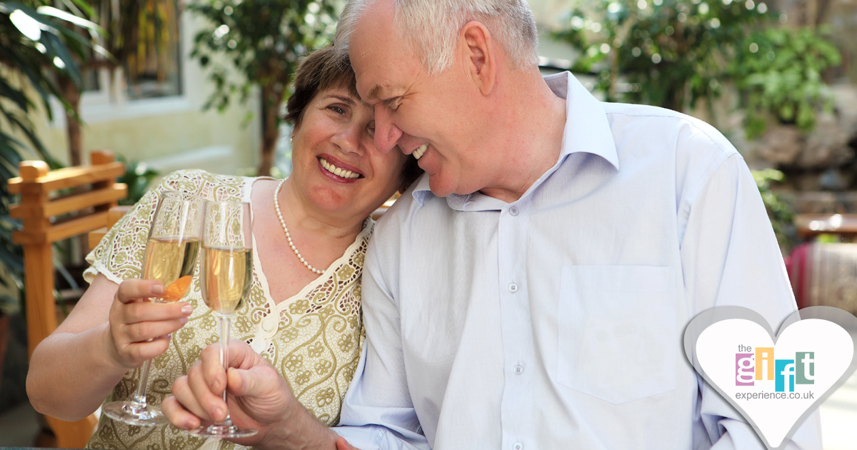 A couple celebrating their anniversary with a glass of wine