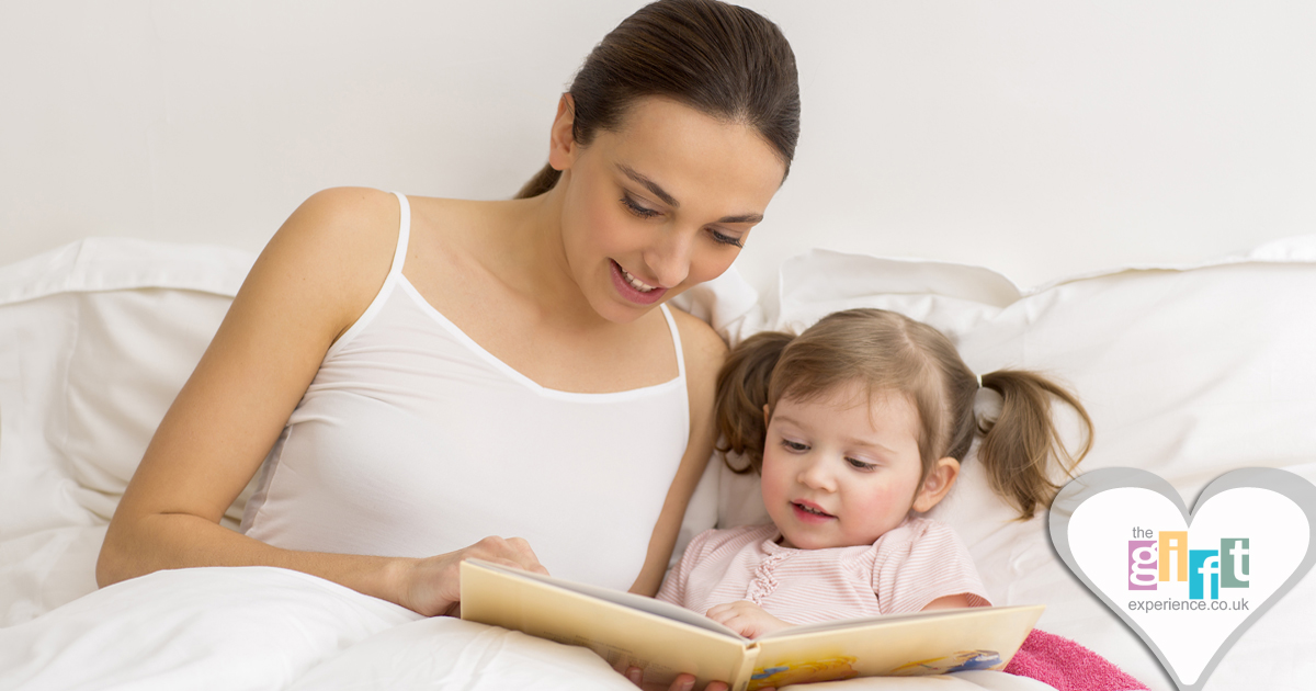 a mother and child reading a bedtime story