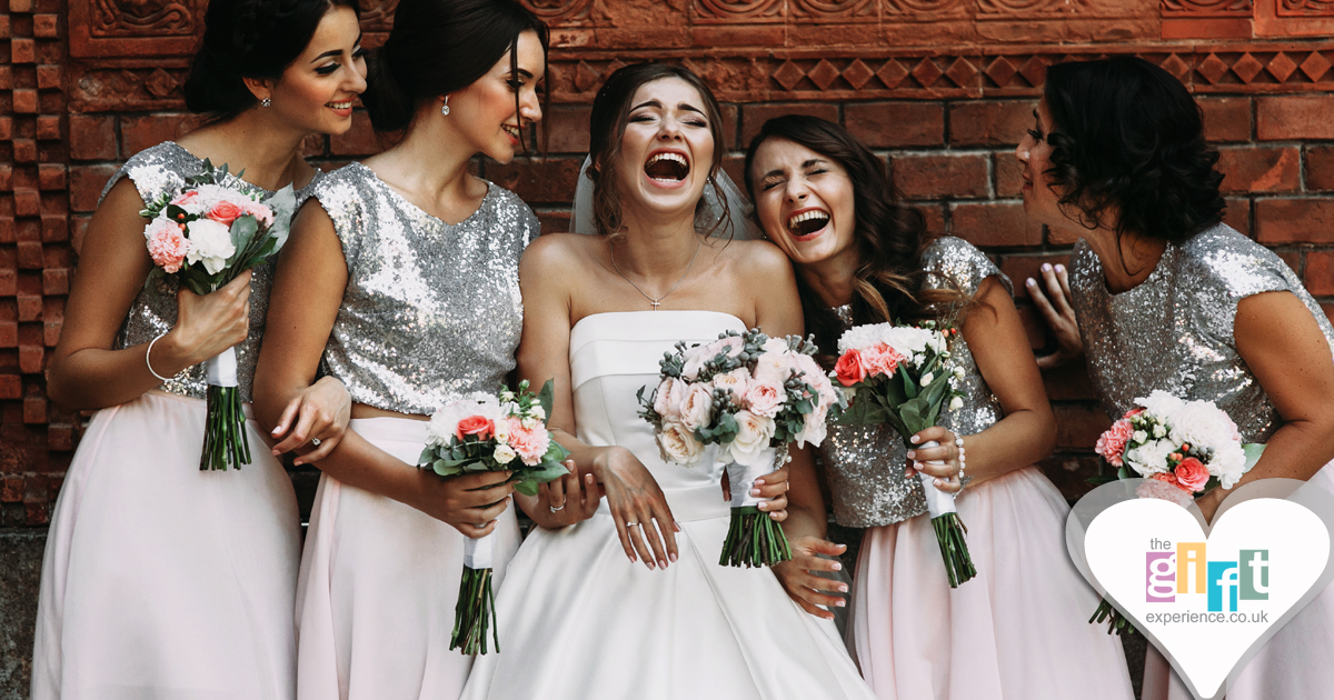 Bride and bridesmaids enjoying the wedding day