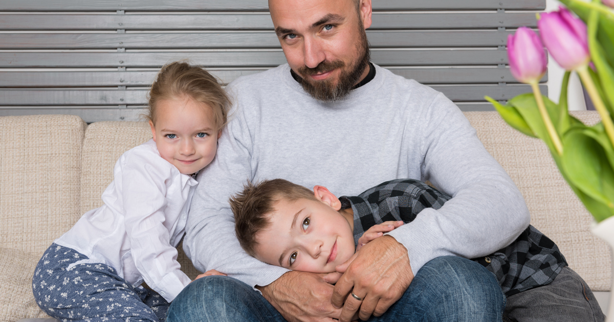 Dad and children on the sofa