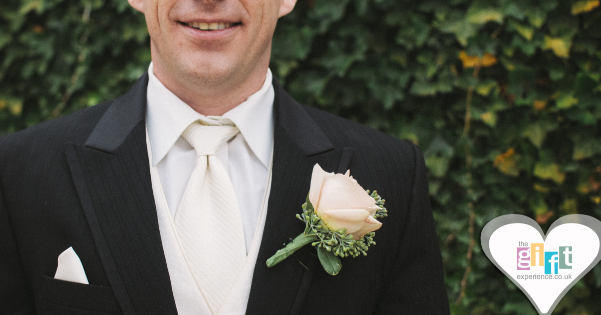 A groom in his wedding attire