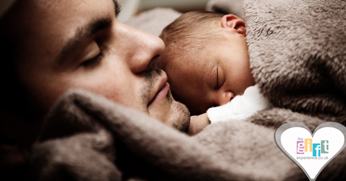 Dad and Baby sleeping on his First Father's Day