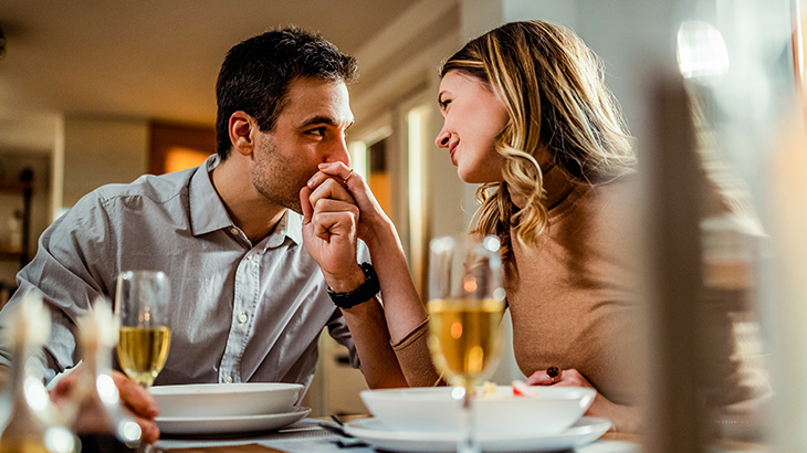 Couple enjoying a meal together as part of a romantic gift experience, perfect for anniversaries, special occasions, and memorable celebrations
