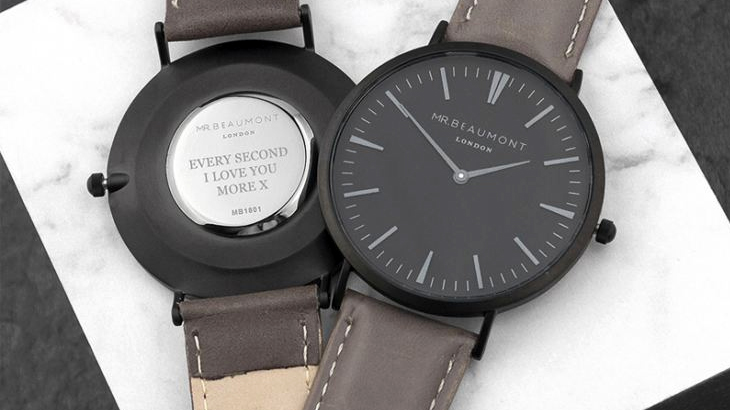 Men’s modern-vintage personalised watch with black face, brown strap and engraved reverse, timeless anniversary gift