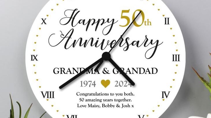 50th anniversary clock personalised with couple’s names, dates, and custom message, unique golden wedding gift idea