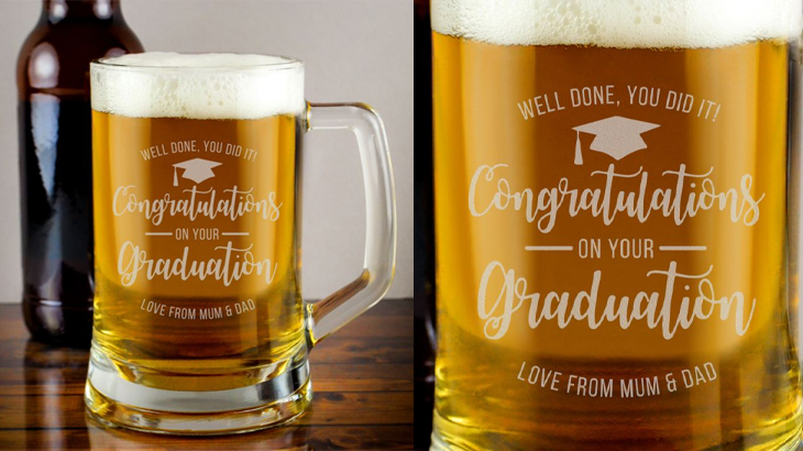 Personalised graduation pint tankard glass with mortar board design, 'Congratulations on your graduation' text, and custom message