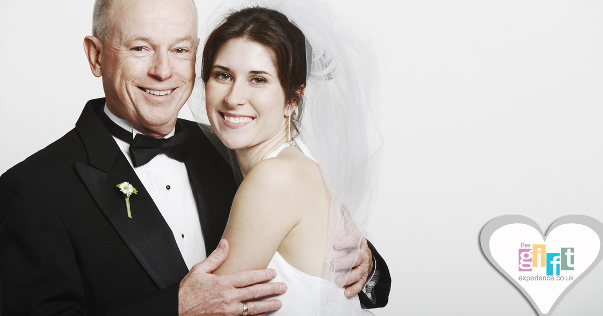 The Bride and Father of the Bide share a hug The Bride and Father of the Bide share a hug