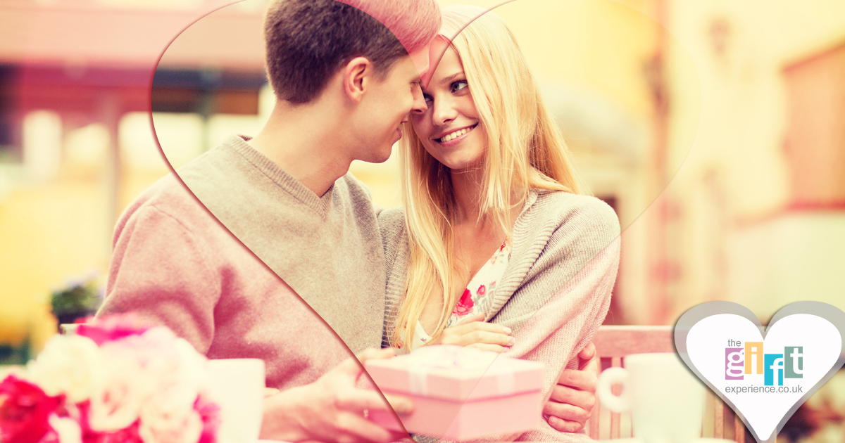 man giving his partner a valentine's day gift