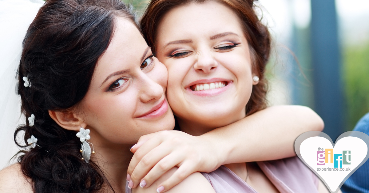 The Bride hugging the Matron of honour at her wedding The Bride hugging the Matron of honour at her wedding