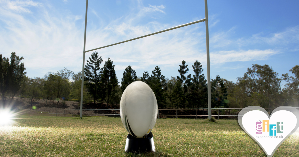 A Rugby ball waiting to be kicked through the posts