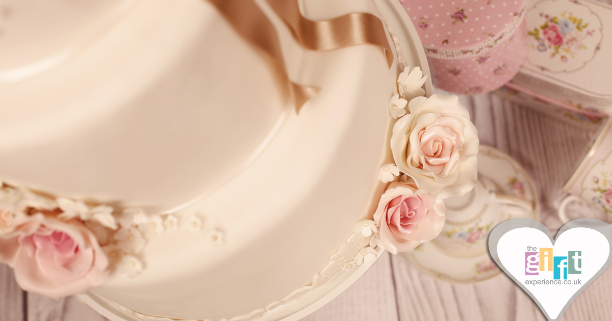 Ivory Wedding Cake with pink icing roses